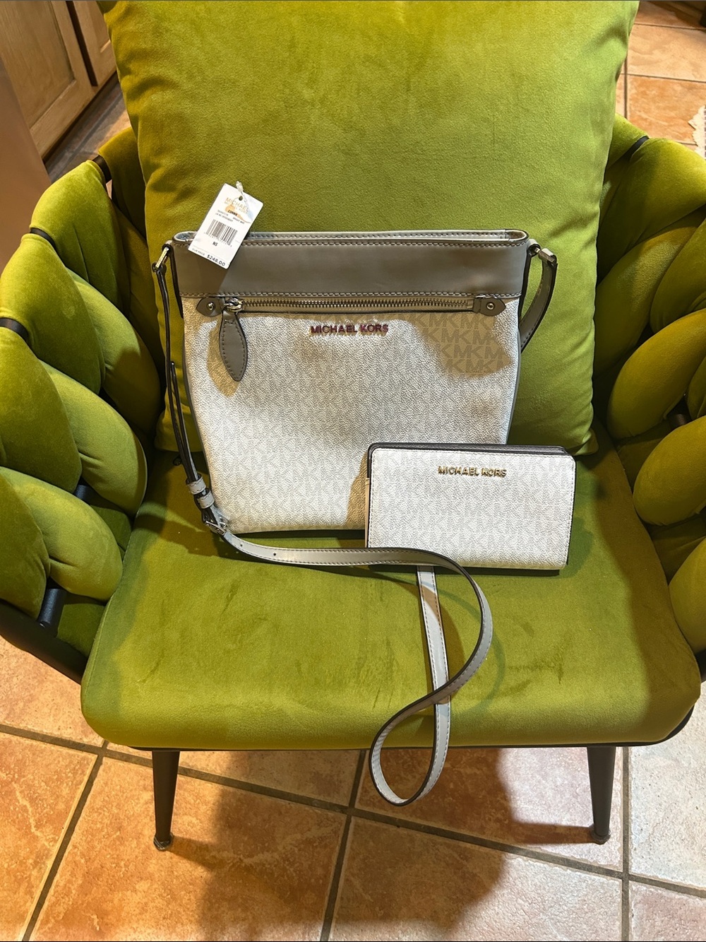 Michael Kors Connie Crossbody Bag accompanied by a matching continental wallet